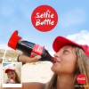 Coca-Cola показала бутылку с насадкой для автоматической съёмки селфи